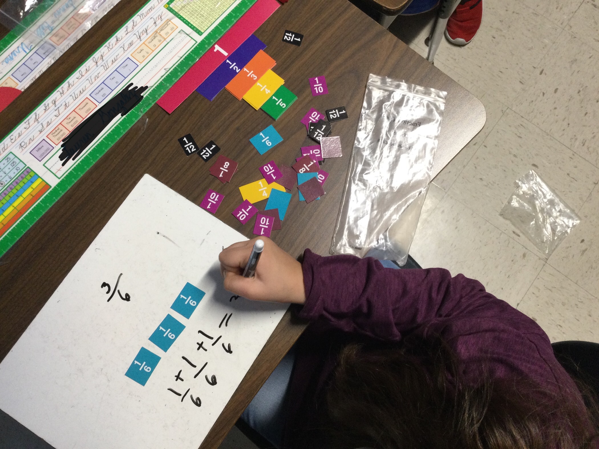4th grade student working on fractions