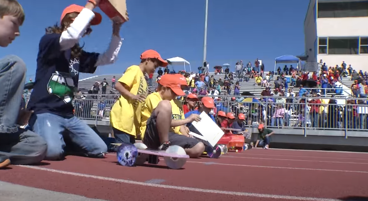 Students at Solar Car Event Competing