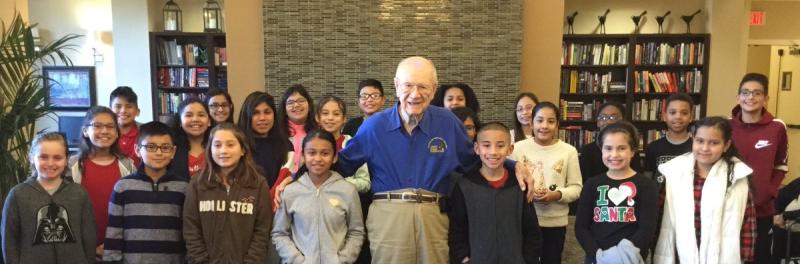 Namesake, Mr. Jimmy Elrod at library with Elrod students.