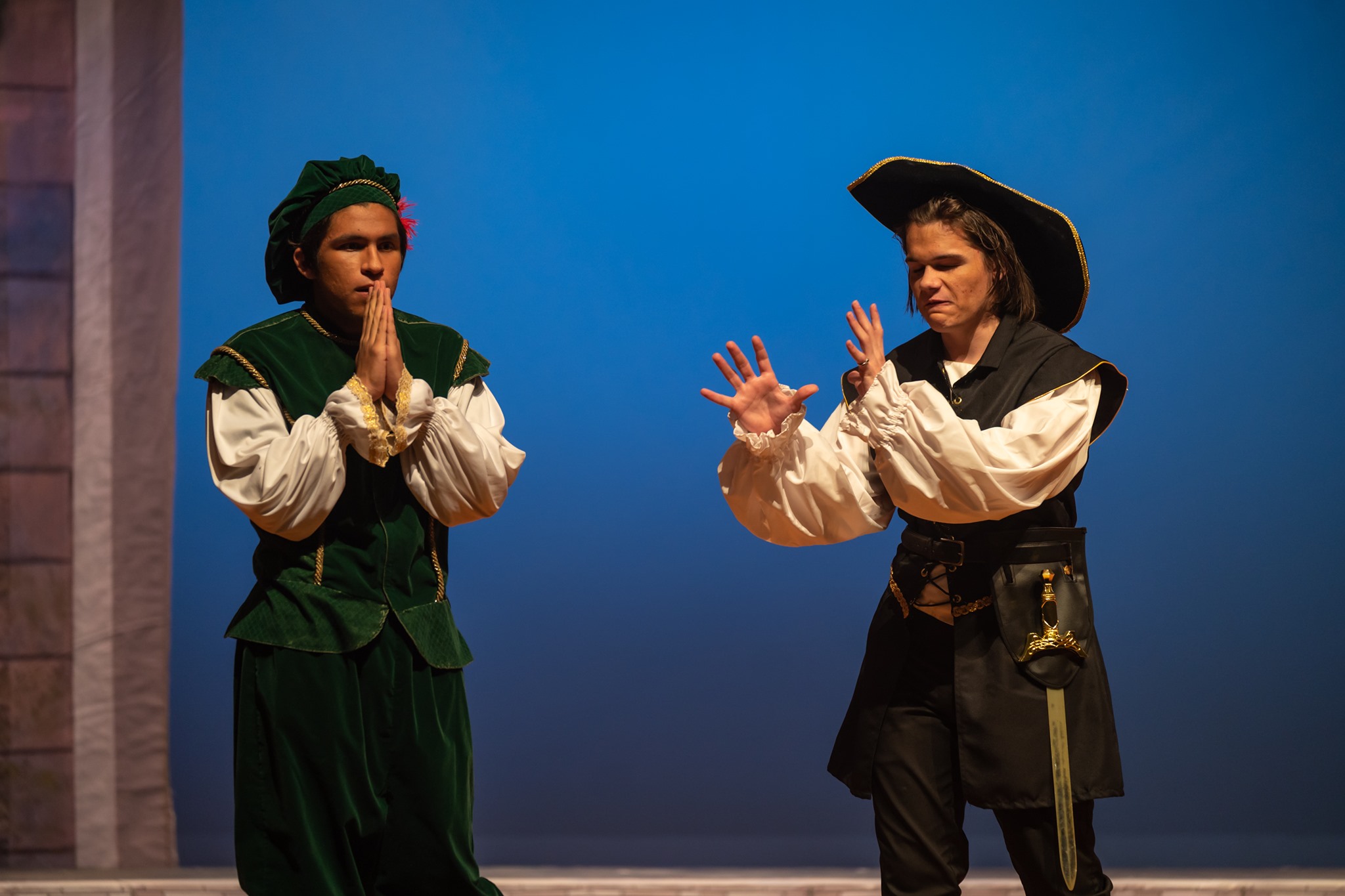 Two Taft theater students performing on stage 