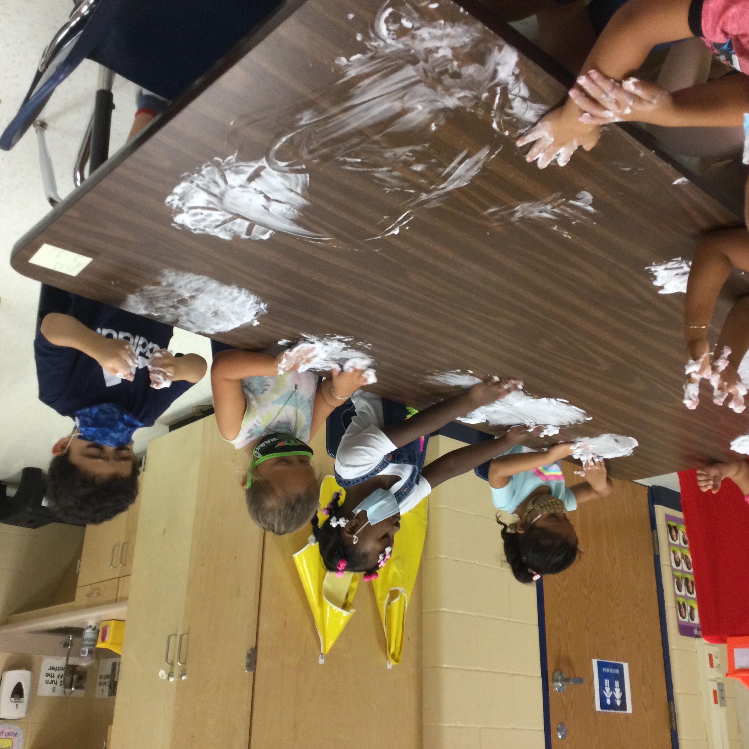 Students playing with glue. 