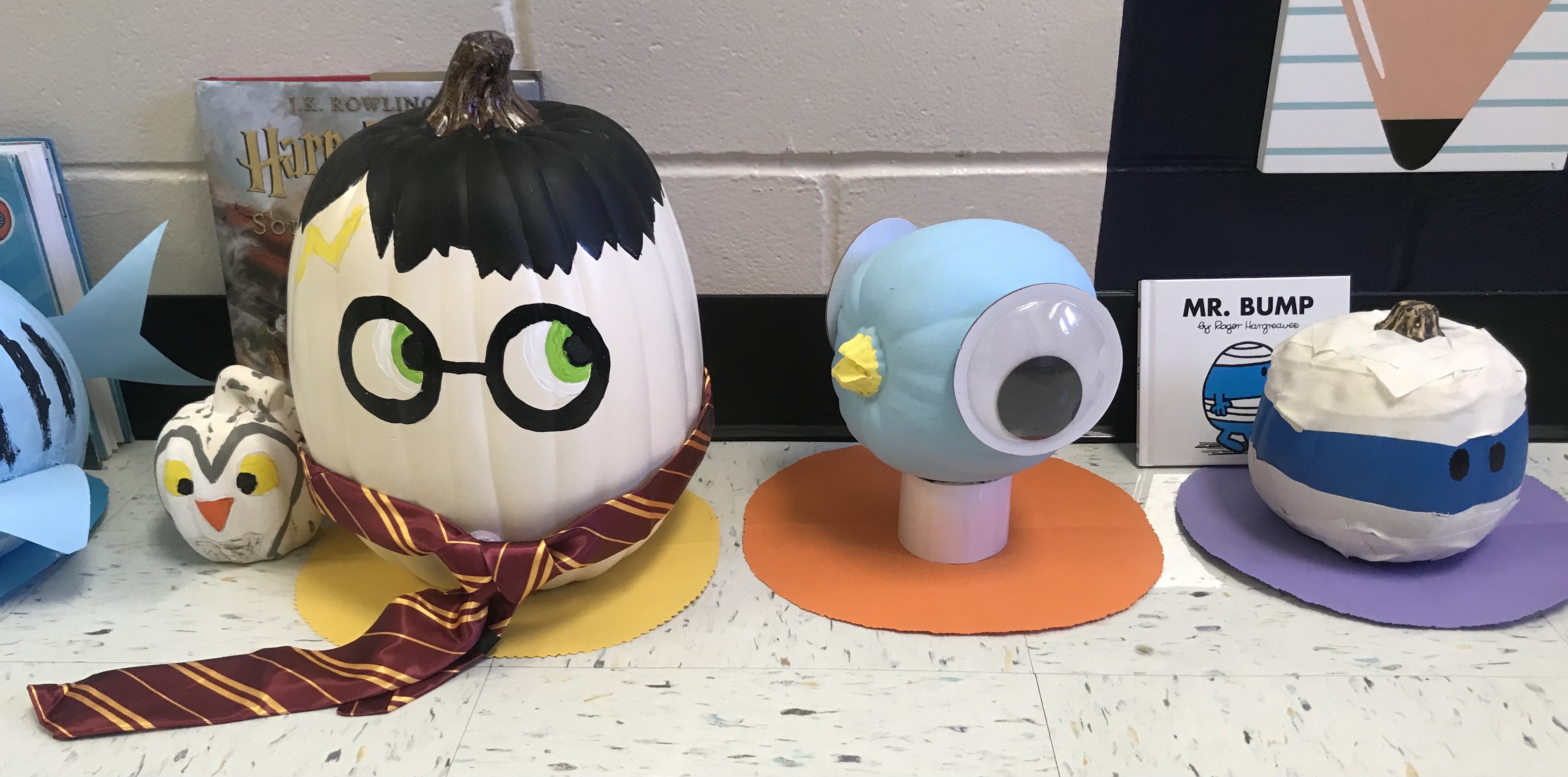 Pumpkins decorated like a Hedwig, Harry Potter, a pigeon and a mummy