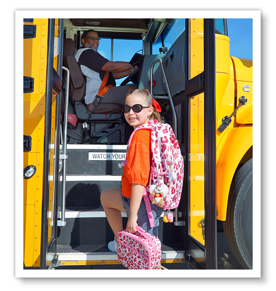 Student getting on school bus