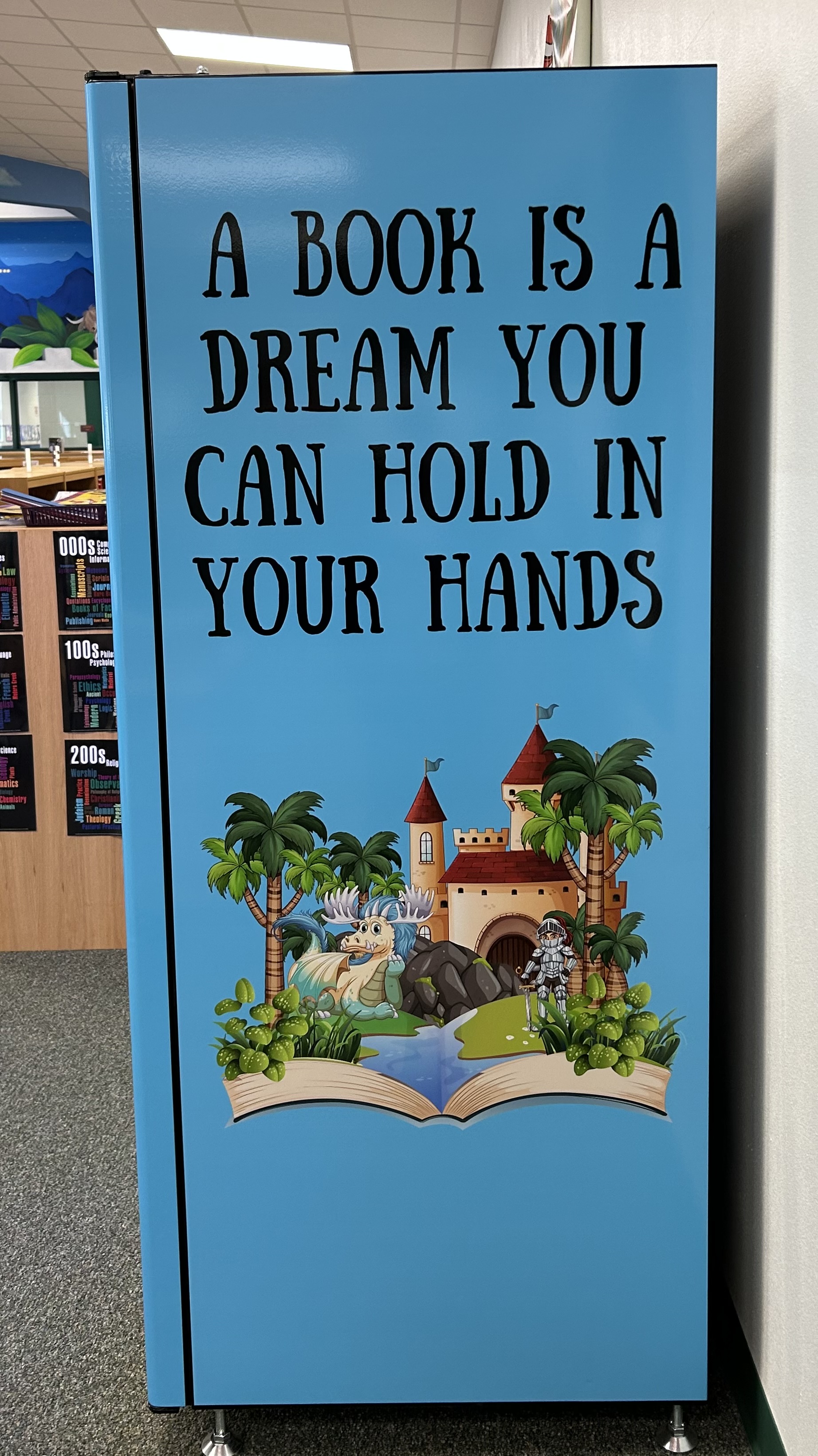 Book Vending Machine side view of a castle landscape