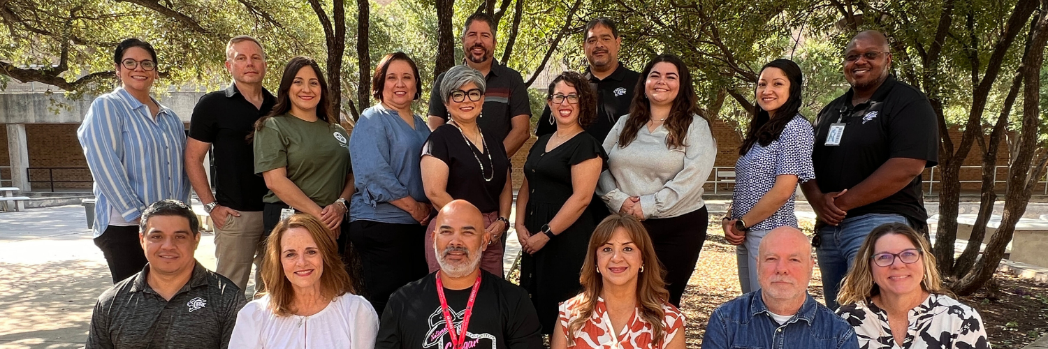Group photo of the Clark Career and Technical Education department outside in the Clark Courtyard