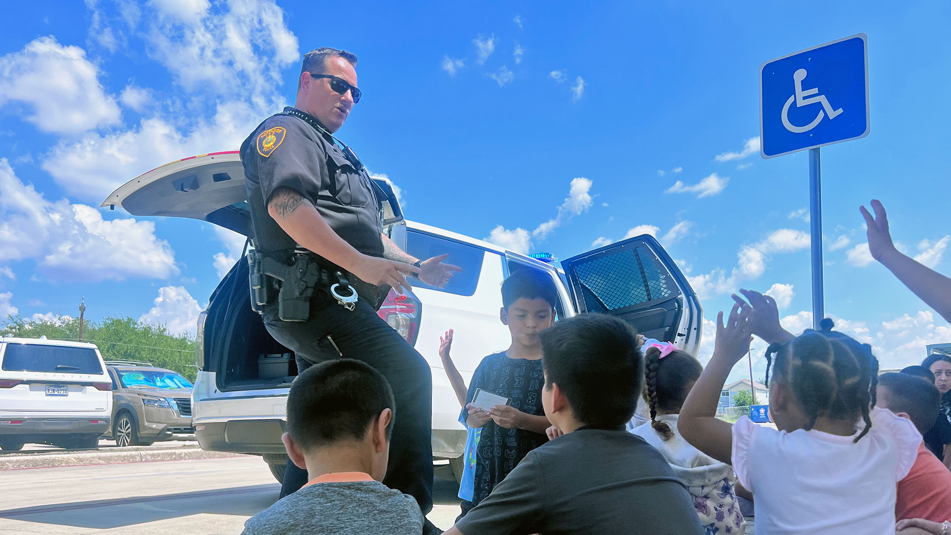 Officer visiting students