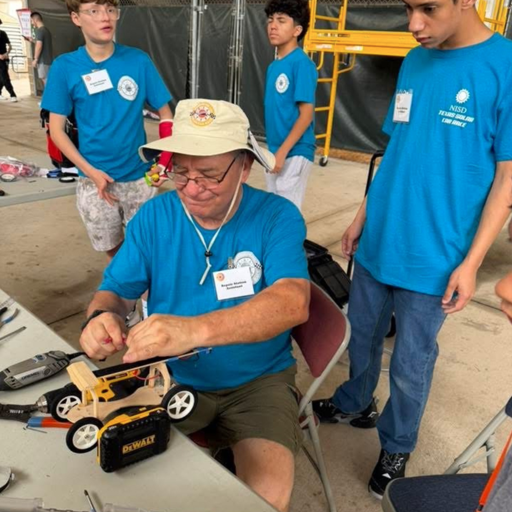 Volunteer helping students