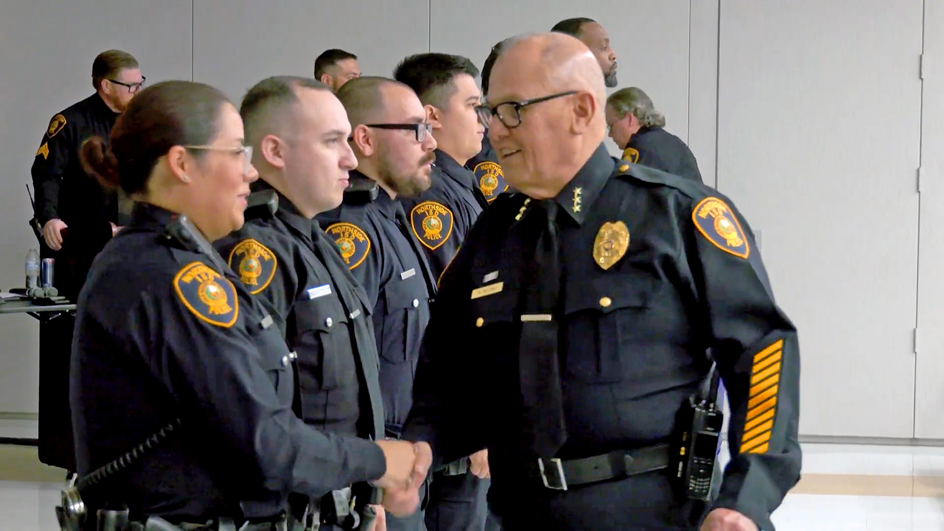 Chief Palomo shaking hands