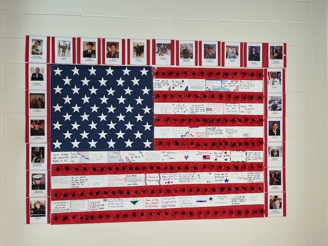 american flag poster with pictures of veterans