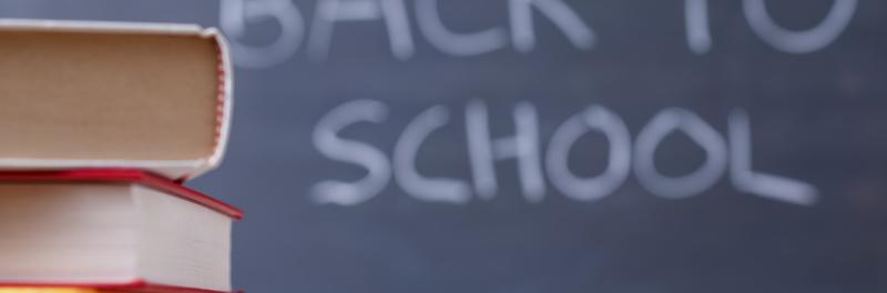 Image of a chalkboard with "back to school" written on it