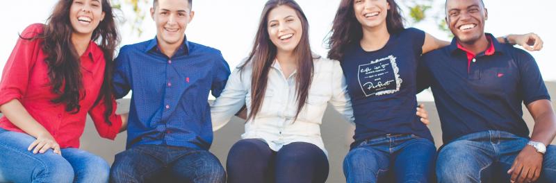 group of students with arms around each other