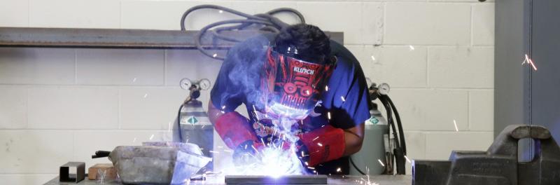student practicing welding skills