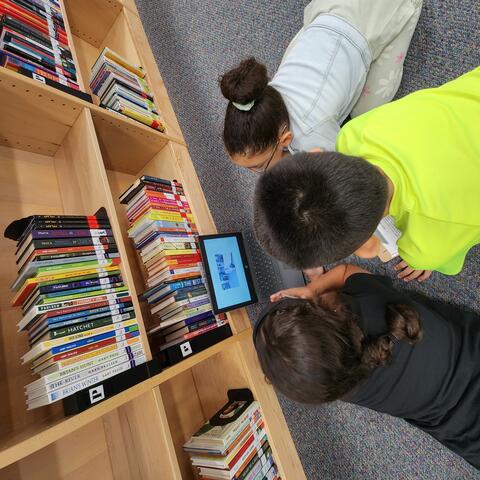 Students completing a scavenger hunt.