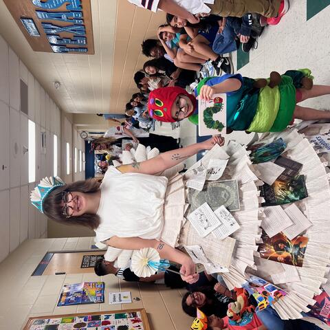 Ms. Mosley dressed as the Book Fairy leading a parade