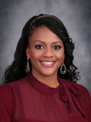 Photo of smiling Associate Principal Chawayipira