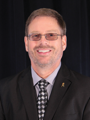 Professional Portrait of Principal Paul Brusewitz.