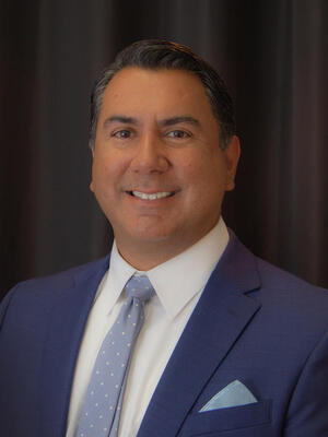 Headshot of Paul Ramirez, principal. 