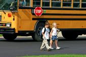 children walking from bus