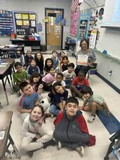 Trustee Corinne Saldana reads