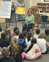 Trustee Karen Freeman reads