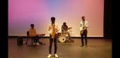 Taft Jazz Band members play instruments on stage 